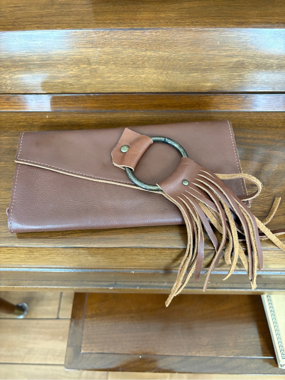 Brown Leather Fringe Clutch with Metal Ring Accent